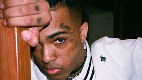Jahseh Dwayne Onfroy (January 23, 1998 – June 18, 2018), better known by his stage name XXXTentacion, was an American rapper from Lauderhill, Florida. Onfroy was known for his versatility with his music, which ranges from aggressive, punk rock-inspired hip hop, to somber and slower R&B style songs, to even heavy metal.